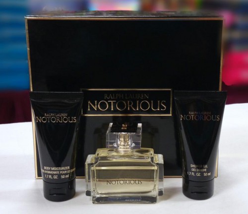 Notorious by Ralph Lauren 3-PCS Set for Women 1.7 fl.oz / 50 ml Eau De Parfum Spray 1.7 oz Body Moisturizer + Shower Gel