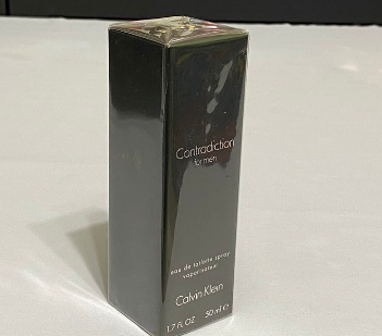 Contradiction Calvin Klein Men 1.7 fl.oz / 50 ml eau de toilette spray, Vintage